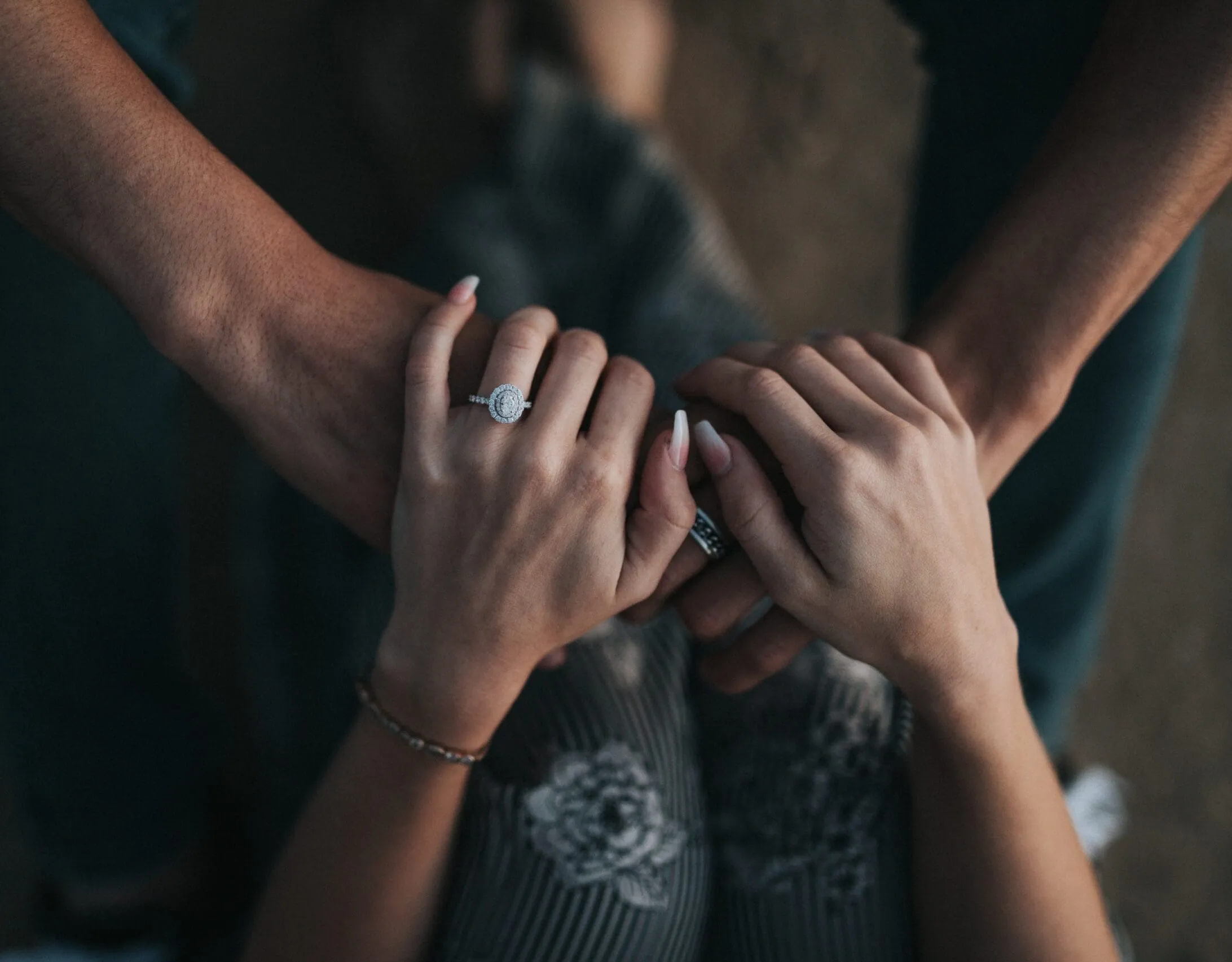 man and woman holding each others hands